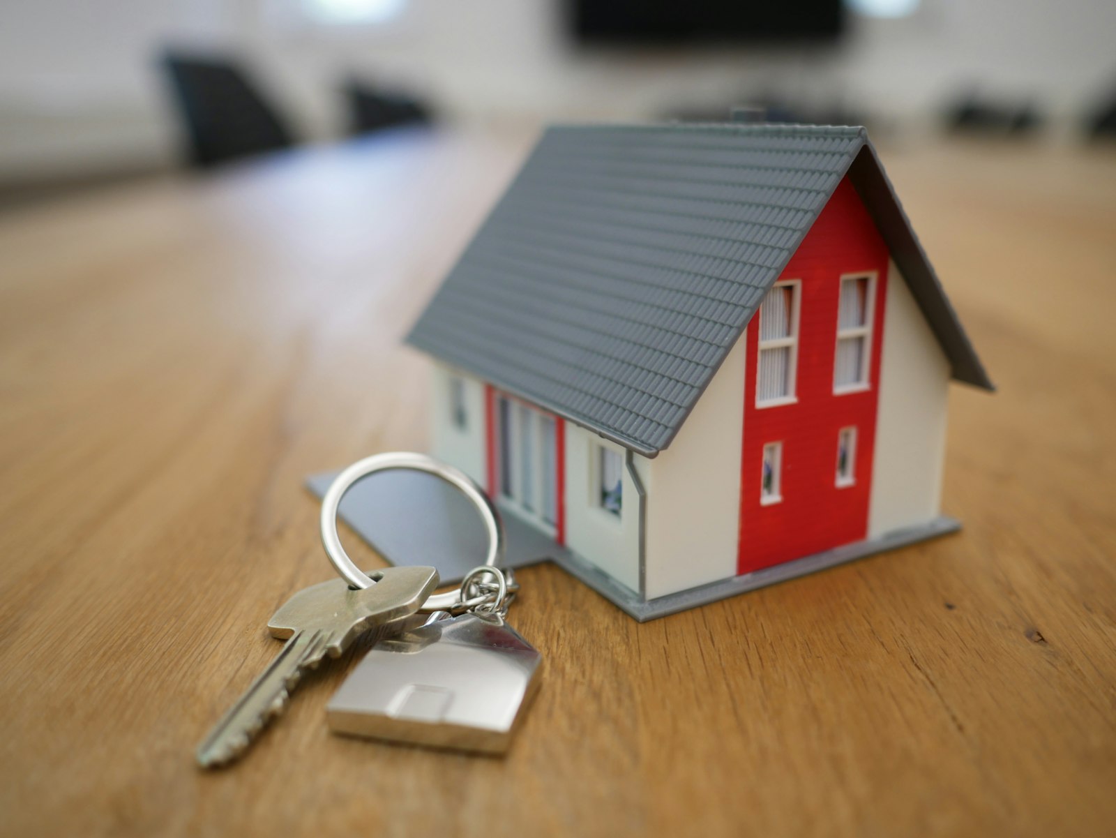 Real estate agent handing over house keys to new owners in Mauritius